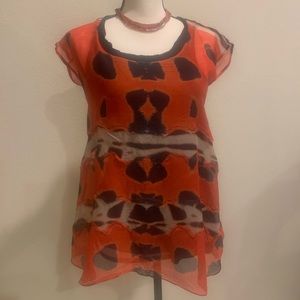 Diane Von Furstenburg red and black silk top. Size 0